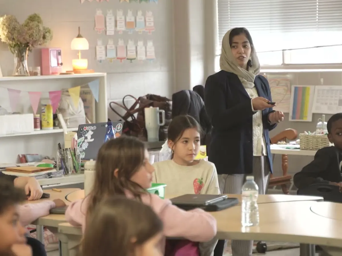 An instructor teaches a class with Micro:bit kits