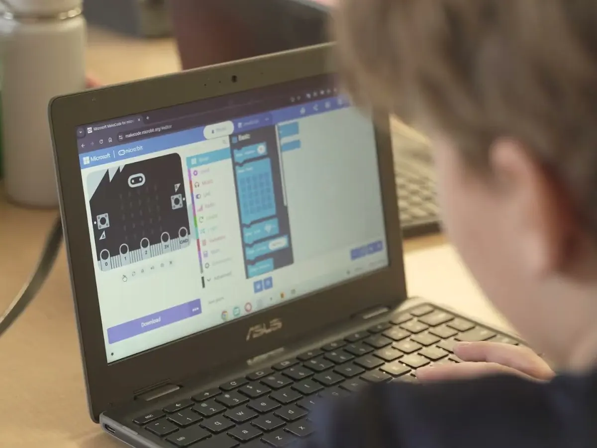 A student codes a Micro:bit on a Chromebook